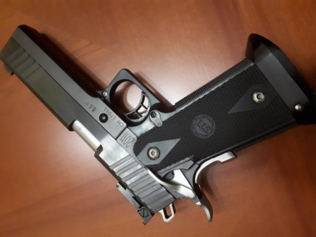 Vendo STI Edge del calibre 9 milímetros más kit del 22 el kit del veintidós está por estrenar ni un solo 00