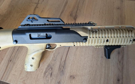 Carabina HI-POINT 995TS cal 9mm. 

 Poco que decir de este arma, sobradamente conocida. 
Muy poco usada.
Perfecta 11