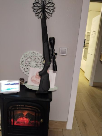 Modificada,buscando maxima presicion,cañon, enfundado en fibra de carbono y culata recortados,guias de 02