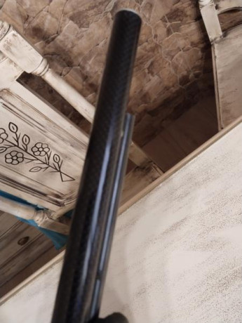 Modificada,buscando maxima presicion,cañon, enfundado en fibra de carbono y culata recortados,guias de 20