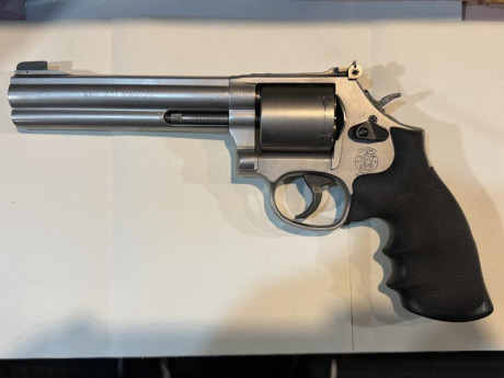 Buenas tardes, vendo mi revólver Smith Wesson 6” ,.357,.38sp,750 euros.un saludo. 00
