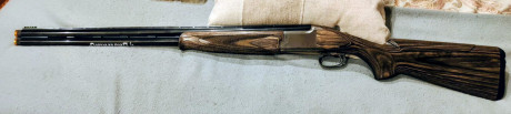 Se vende Browning B-525 Sporting Laminated, 76 cm cañón.  Con Polichokes y maletín. 
Estado impecable, 00