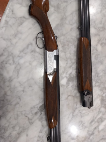 Superpuesta Beretta S56E calibre 12,  monogatillo selector, explusora, con dos juegos de cañones: 4/2 21