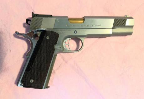 Vendo pistola Infinity de 9 mm parabellum, en perfecto estado. Tiene cañon de 5 y 1/4 pulgadas, imagino 01