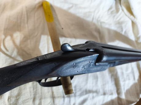 Escopeta paralela marca trust calibre 12/70 largo de cañones 66 en buen estado de conservación y funcionamiento.

120 02