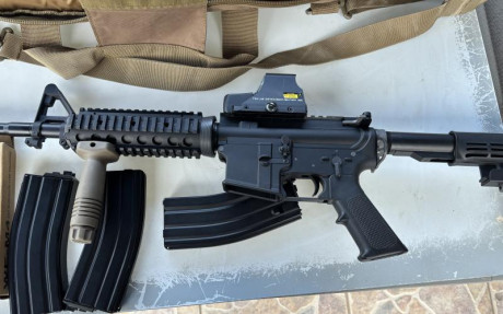 Vendo replica de gas M4 no usada solo se probó, con 5 cargadores 3 de ellos ni se sacaron de la caja. 01