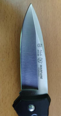 Lote de 2 navajas, en perfecto estado.

Nieto Warfare 
Alpino titanium 440 steel (Nueva)

 VENDIDAS  42