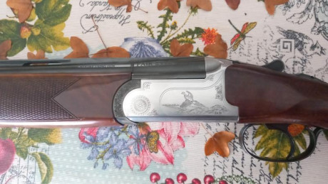 Escopeta monogatillo selector, expulsora, cañones de 71cm, es la versión Sporting, lleva 5 polichok , 80