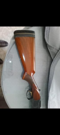 Buenas estoy buscando una escopeta superpuesta expulsora.calibre12. 22