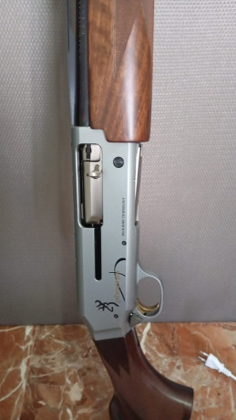 Cambio Browning Phoenix,con dos cajas de cartuchos tiradas......Cambio por escopeta de plato....Está en 00