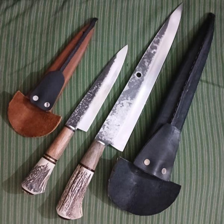 Saludos, 

Por compartir de vez en cuando alguna cosa, os cuelgo imágenes de un cuchillo gaucho (facón, 81