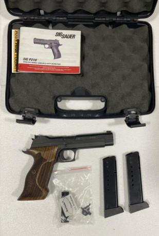 Vendo sig sauer P210 impecable, sin ningún rasguño, 2 cargadores monohilera y maletín original. Muy poco 01