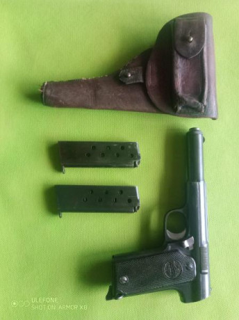 Un amigo vende Astra 400 Puro 9largo. Con una funda de regalo que requiere un recosido. Está en barcelona. 01