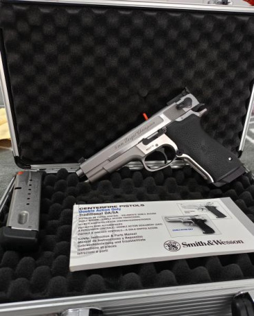 Buenas pongo ala venta una Smith wesson target champion de perfoman center de 5 pulgadas calibre 9 mm 00