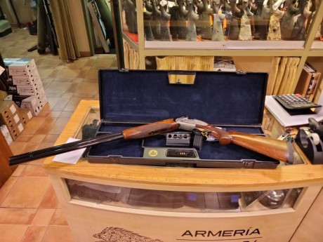 Para quien le interese una escopeta del 12 Lamber de plato cañones de 76cm ventilador. Espulsora de un 00