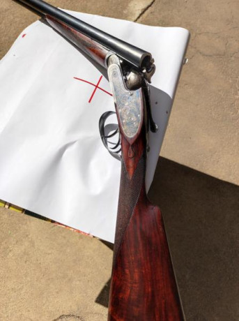 Escopeta con mecanismo tipo Purdey, apertura automática, expulsora, gatillo articulado, guardamonte con 00