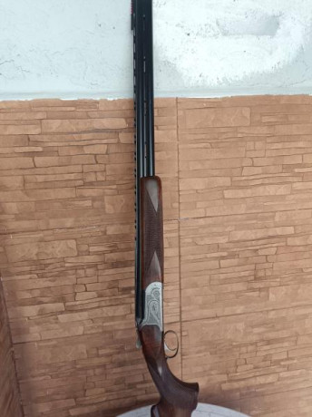 Un amigo vende una escopeta superpuesta Lumar con 75cm de cañon con una y dos estrellas fijas gatillo 01