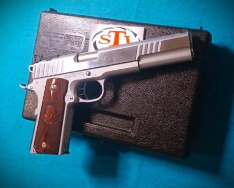  Pongo a la venta  esta pistola de un amigo.

PISTOLA STI TROJAN 6"
2 CARGADORES..
El arma esta en 02