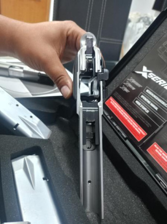 Vendo pistola sig sauer P226 sport cañón de 5 pulgadas inox que decir de esta precisa alemana , 3 cargadores 30