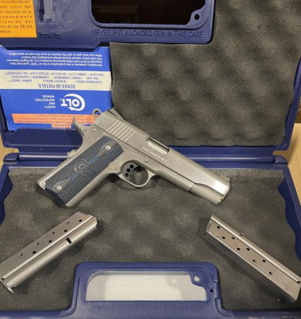 Vendo pistola COLT government competition 1911 de 9mm
*   Acabado en acero inoxidable
*   Cañón 5" 01
