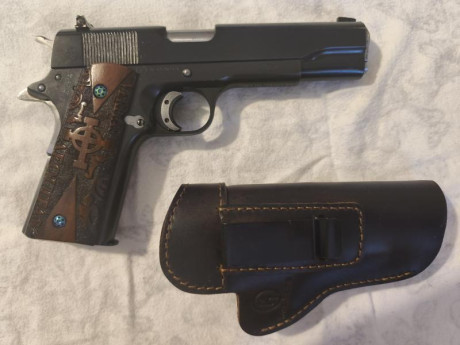 En venta preciosa pistola Rockisland Armory modelo 1911 en pavón negro mate, calibre 45 acp .
Tiene un 02