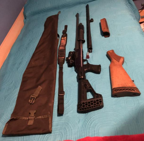 Vendo escopeta de corredera MOSSBERG 500 calibre 12/76 con dos cañones; uno liso de 71 cm con chokes intercambiables 01
