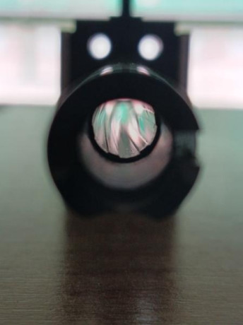 Vendo pistola calibre 32 para fuego central, con su maletin y dos cargadores. Cacha de nogal, talla M 00