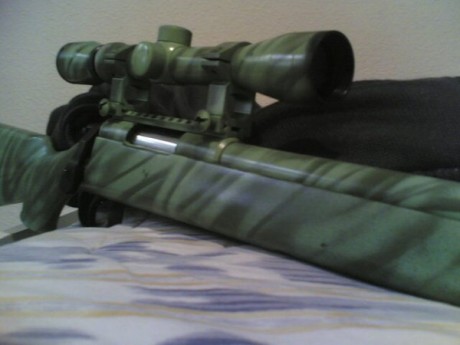 Aquí enriquezco el asunto con unas imagenes de armas pintadas por mi. Si alquien quiere información sobre 00
