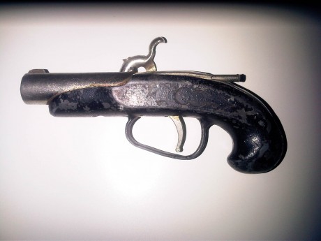 Estas son las fotos, es un arma que la tengo desde bastante tiempo pero no tengo ninguna informacion. 02